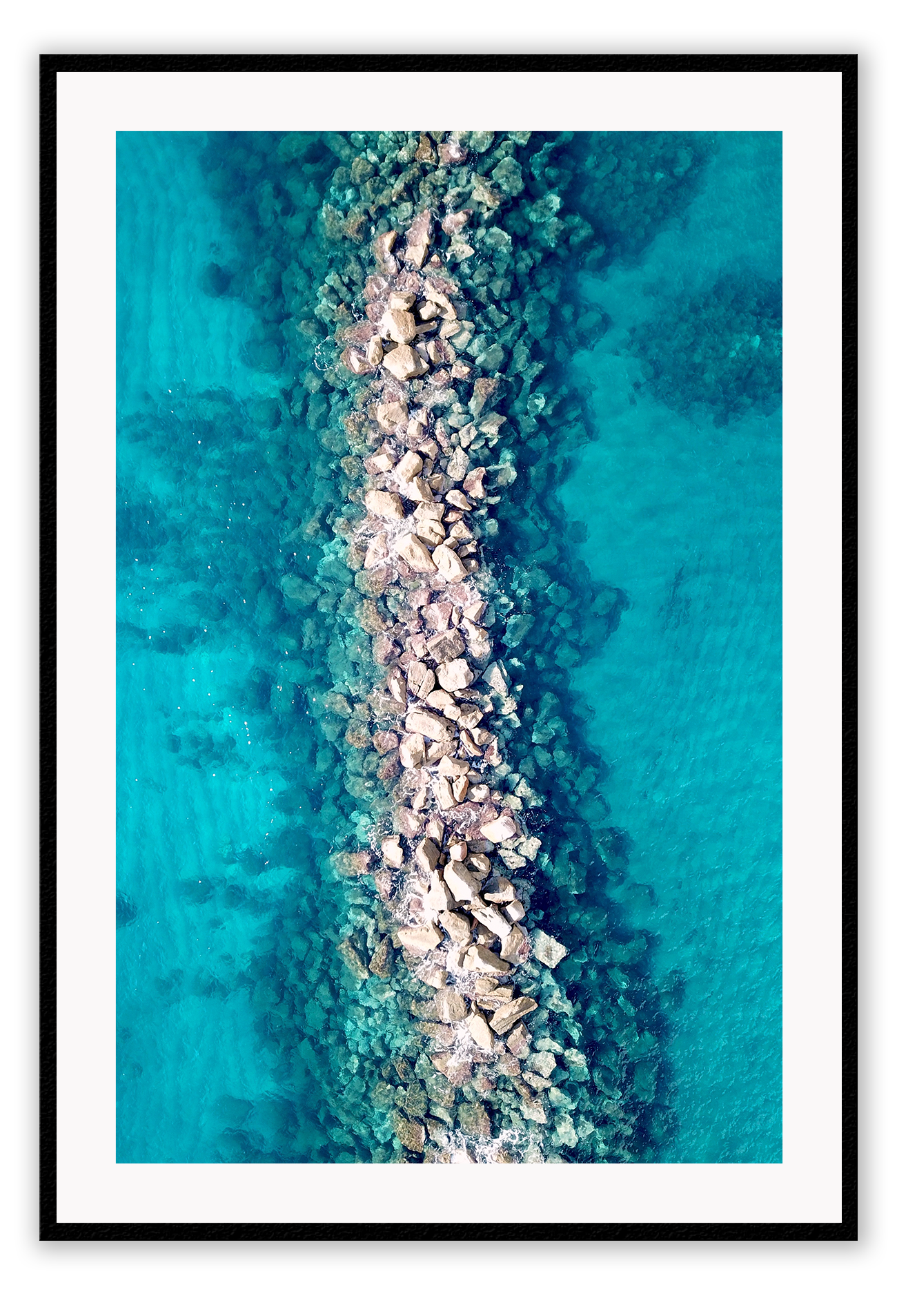 Ocean water rocks blue symmetry waves ripple clear sea